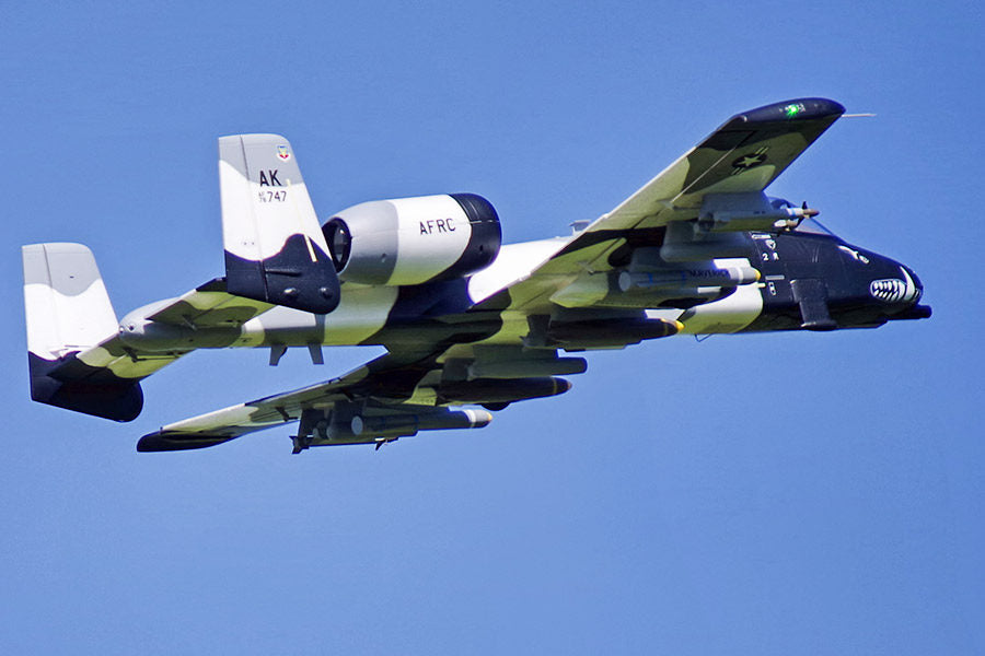 FMS 70mm A-10 Thunderbolt II V2 PNP RC jet with shark-mouth nose, camouflage, and weapons, in flight.