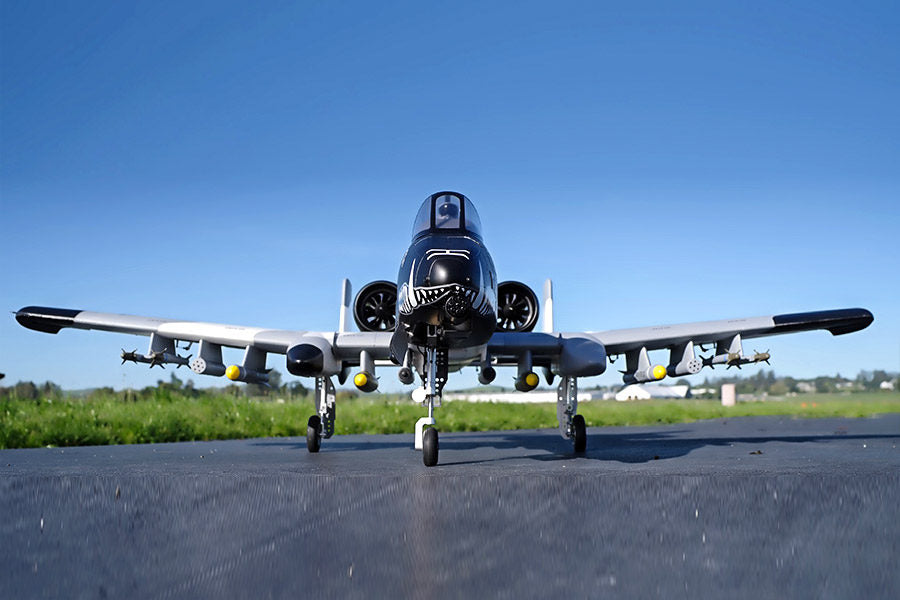 FMS 70mm A-10 Thunderbolt II V2 PNP jet model with shark mouth, on runway, loaded with missiles