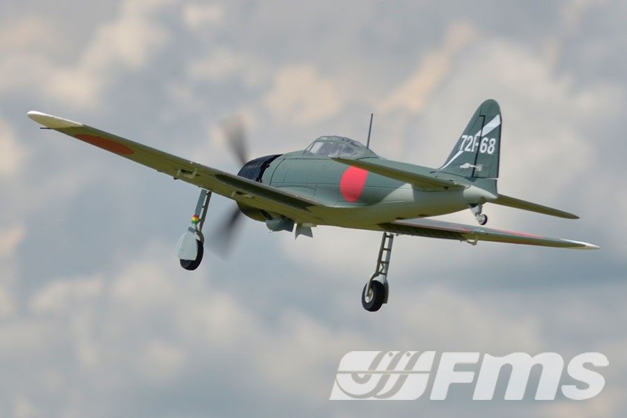 FMS 1100mm A6M5 Zero PNP scale model aircraft in flight. Green fuselage with red Hinomaru markings.