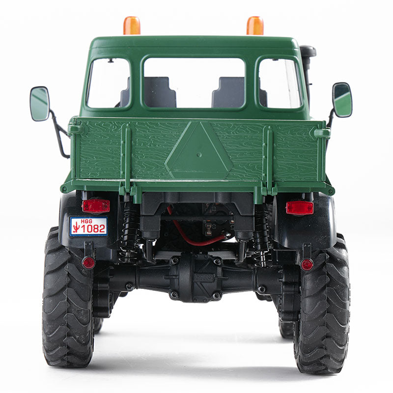 Green FMS 1:24 FCX24 Mercedes-Benz Unimog 421 RTR rear view with license plate HGG 1082