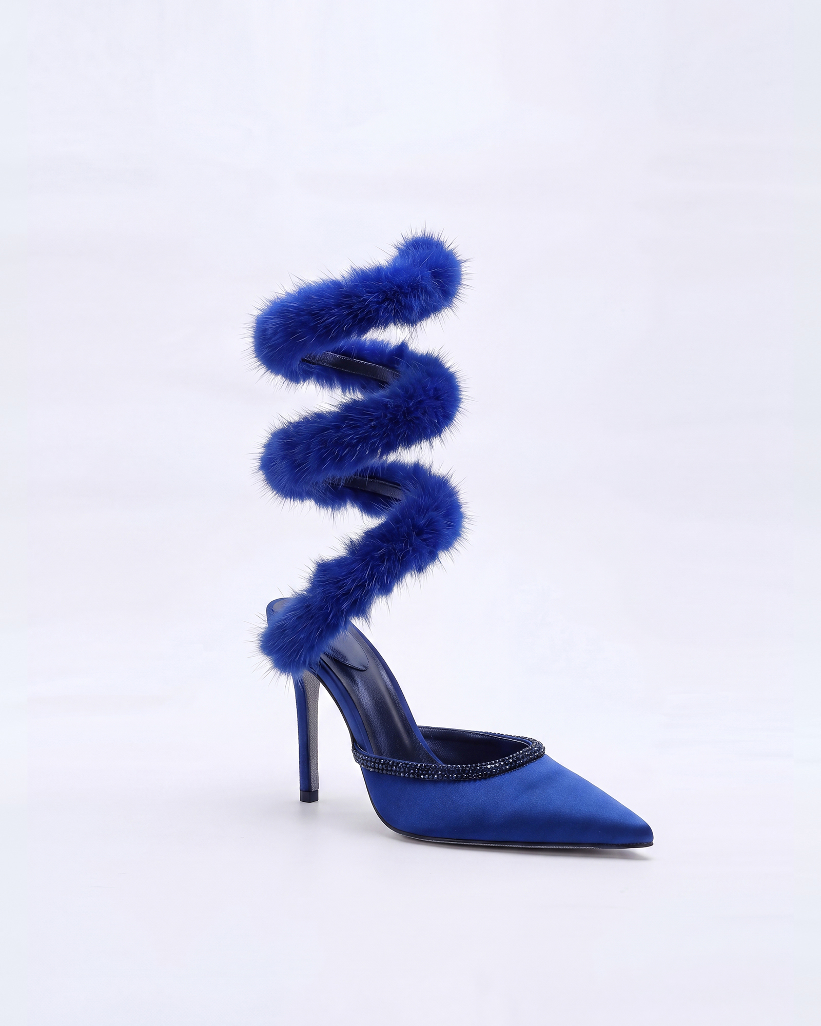 Kaie Faux Fur Trimmed Snake Pumps In Royal Blue