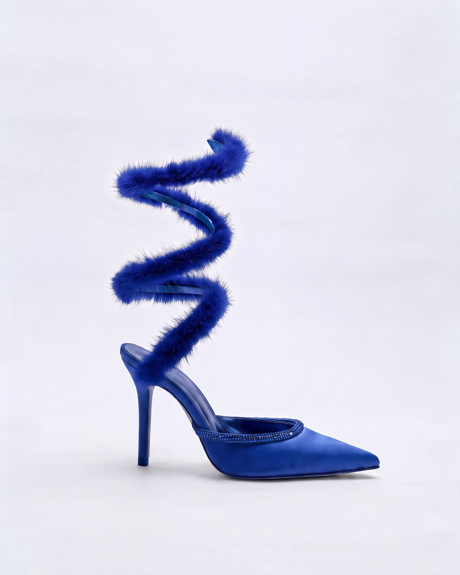 Kaie Faux Fur Trimmed Snake Pumps In Royal Blue