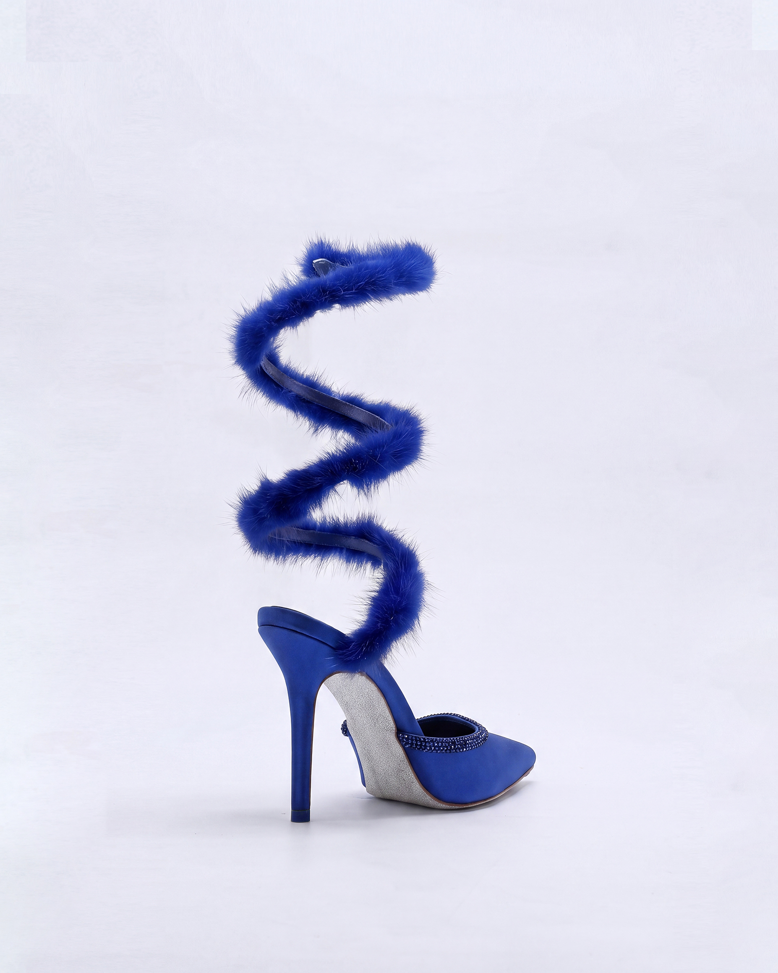 Kaie Faux Fur Trimmed Snake Pumps In Royal Blue