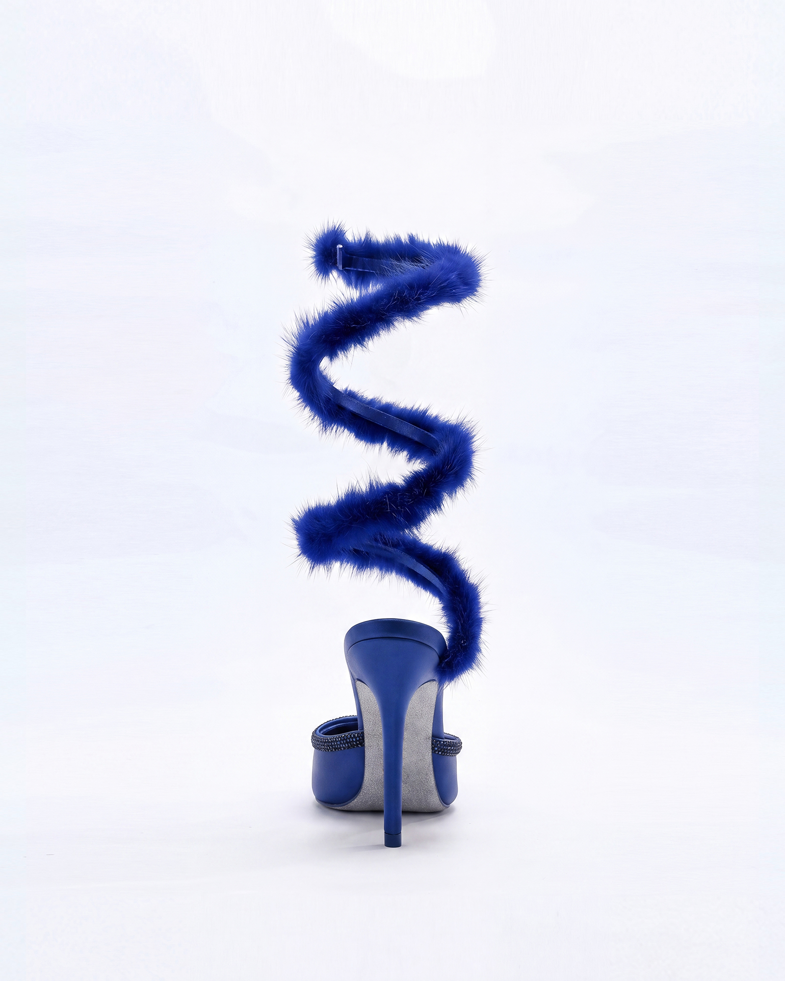 Kaie Faux Fur Trimmed Snake Pumps In Royal Blue