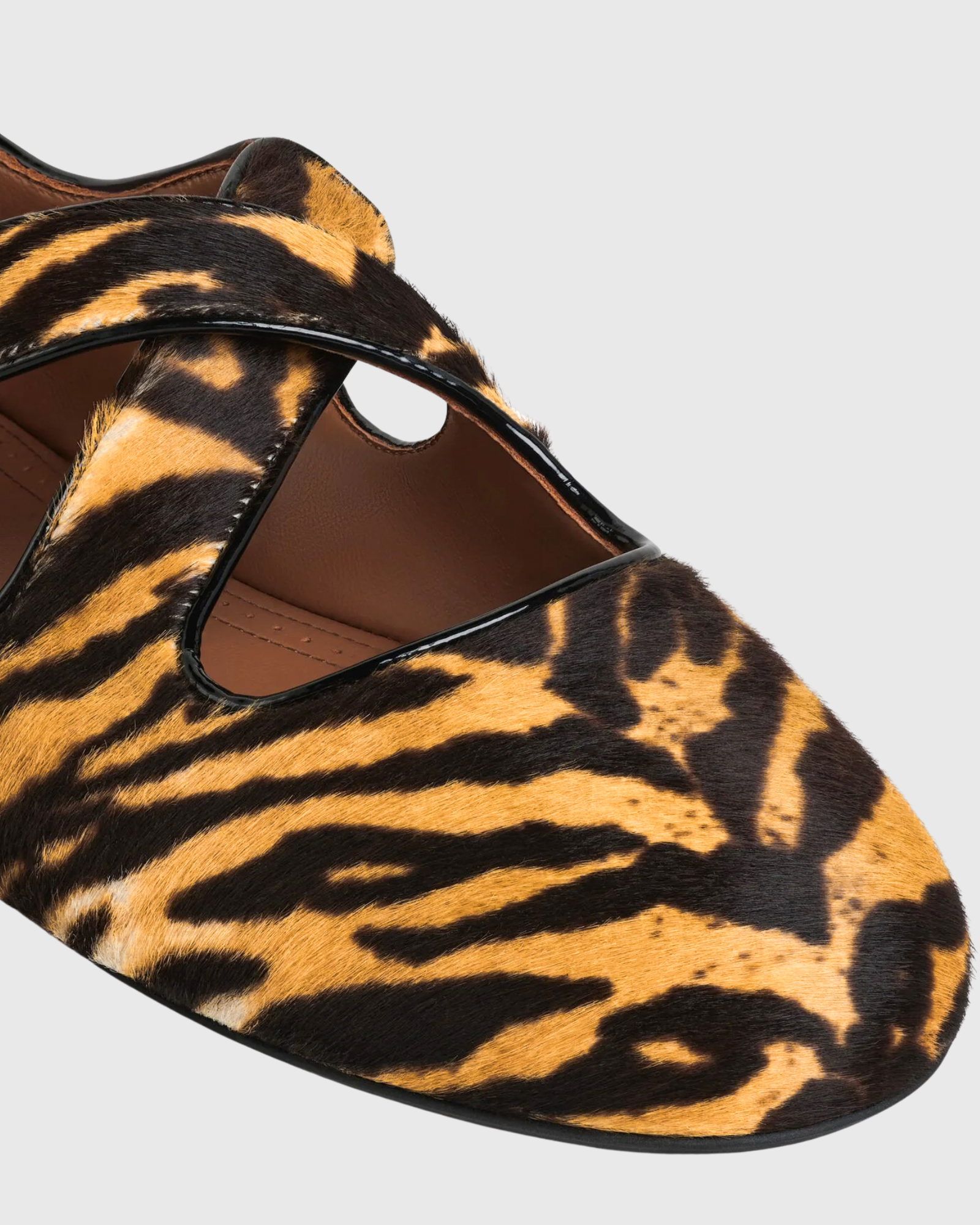 Najat Tiger Print Cross Strap Flats