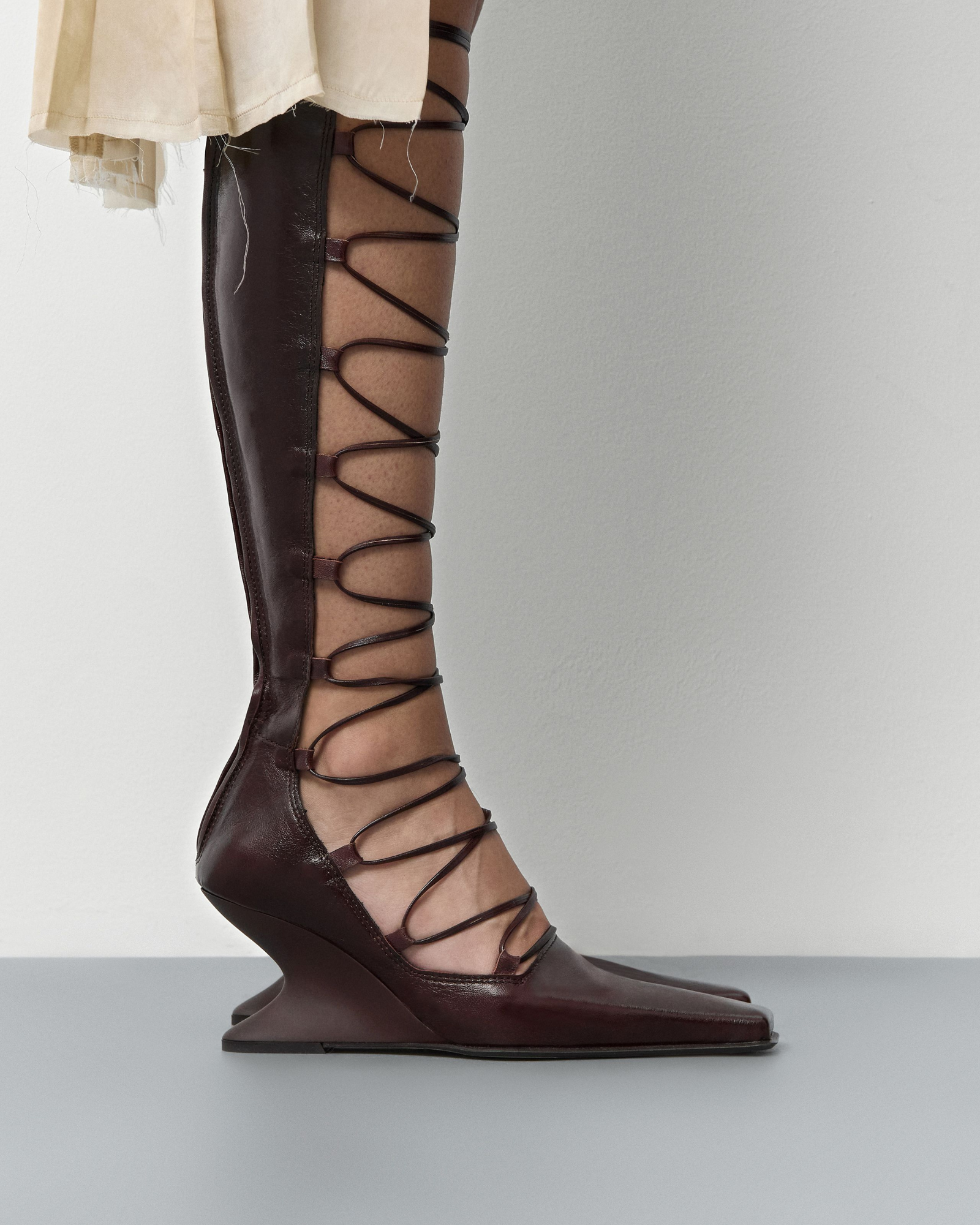 Larya Lace Up Wedge Knee High Boots In Wine
