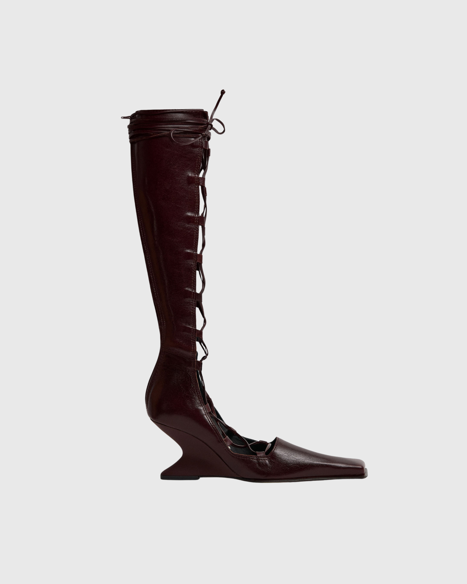 Larya Lace Up Wedge Knee High Boots In Wine