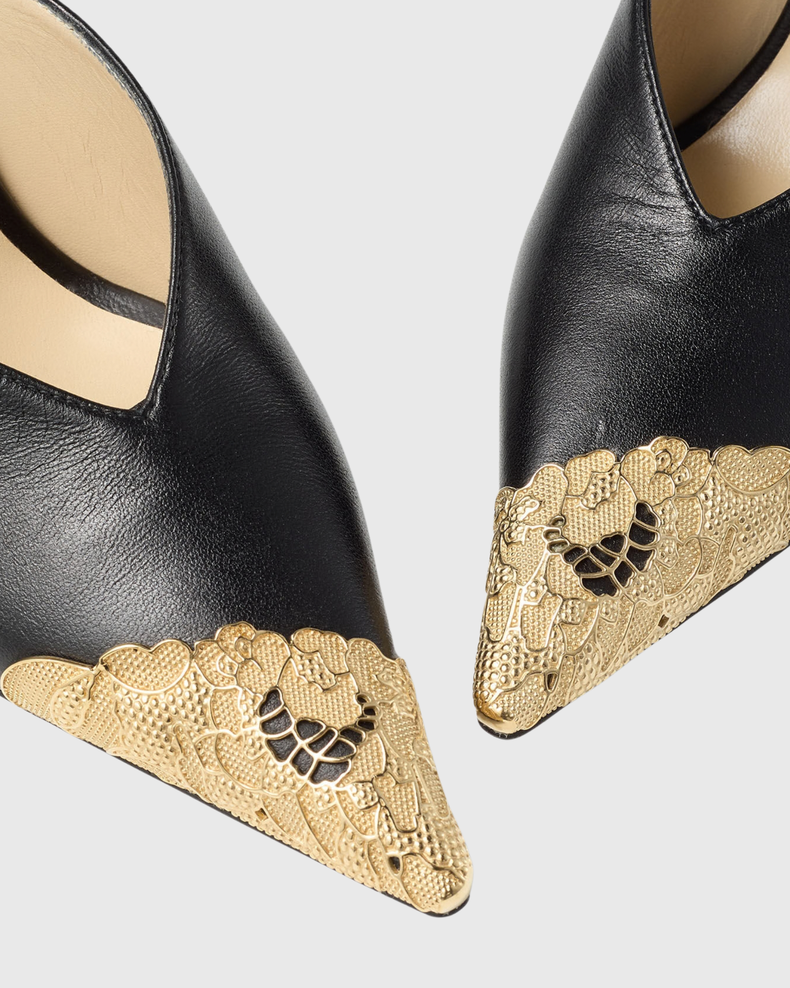 Nadira Metal Toe Strap Pumps In Black