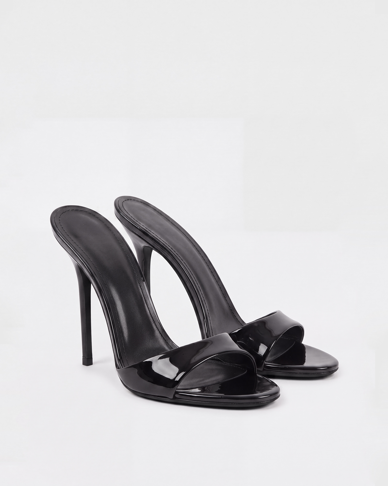 Leslie Patent Leather Mules In Black
