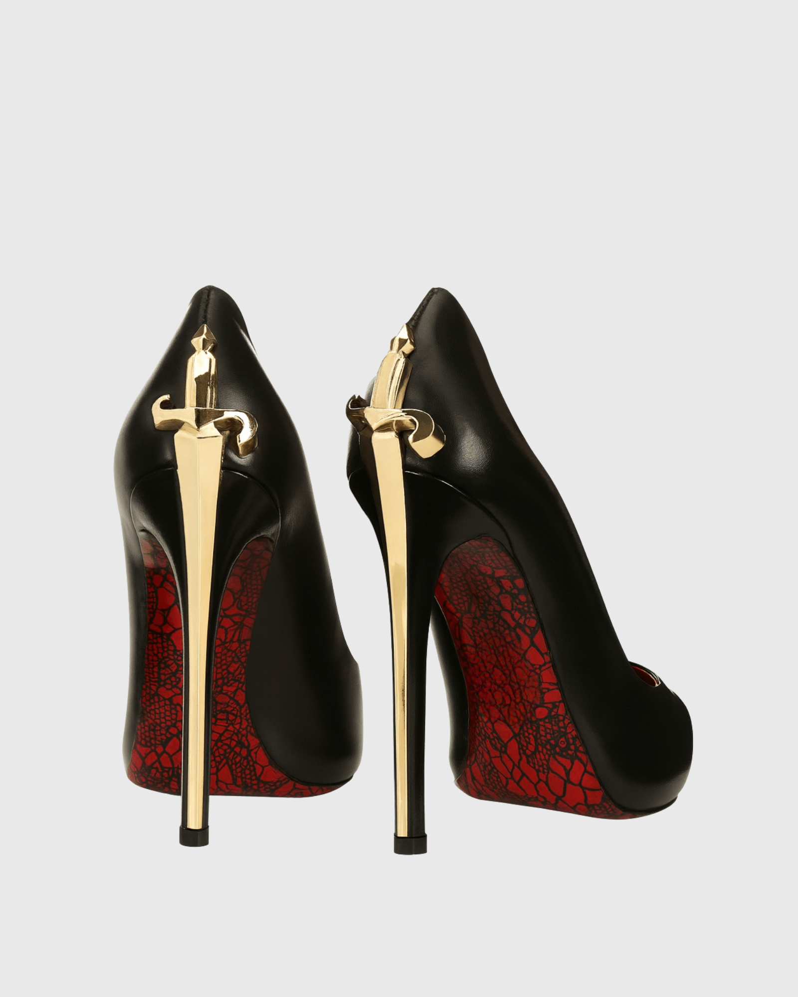 Eadgar Gold Sword Heel Pumps In Black