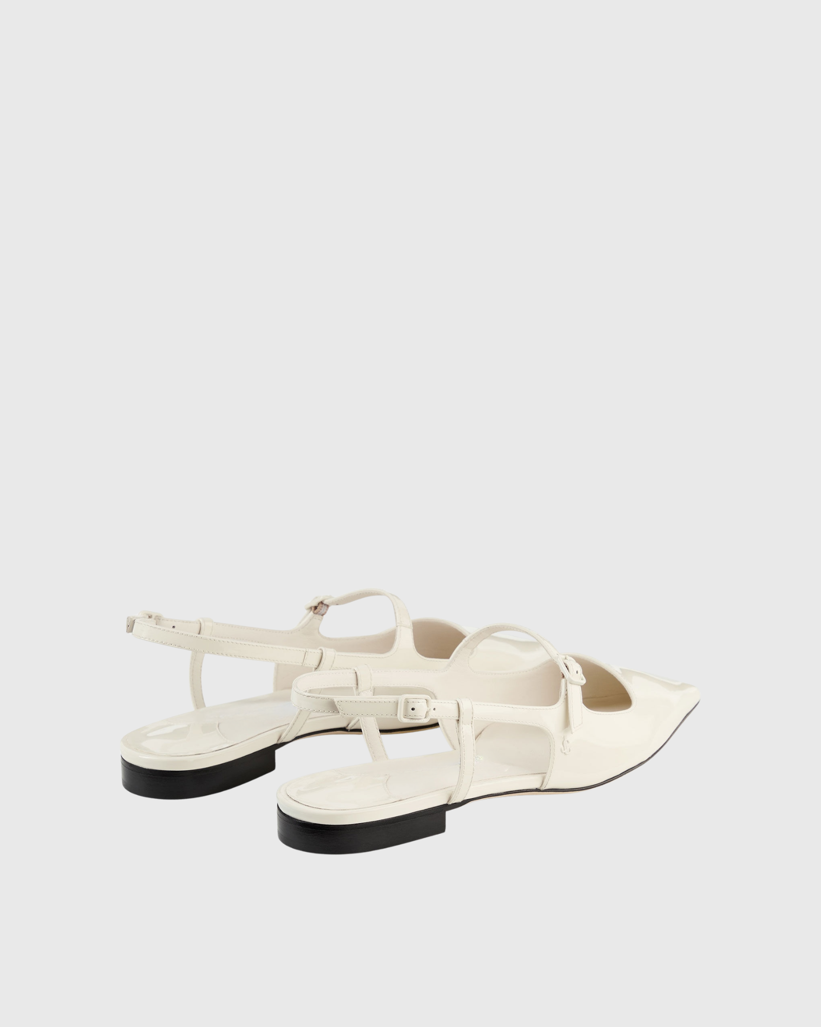 Nerina Pointed Toe Cut-Out Flats In White