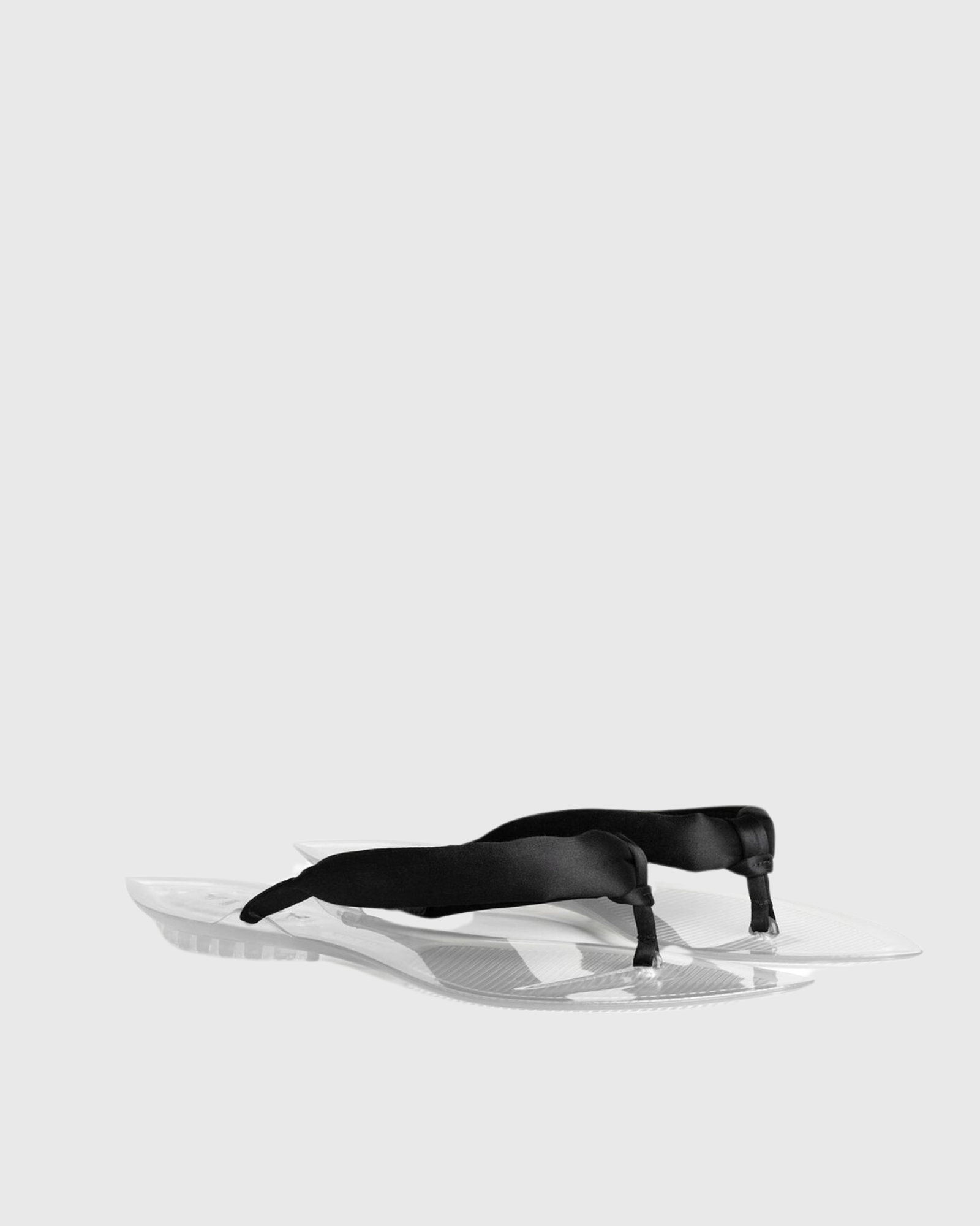Solenne Jelly PVC Thong Slippers In Black
