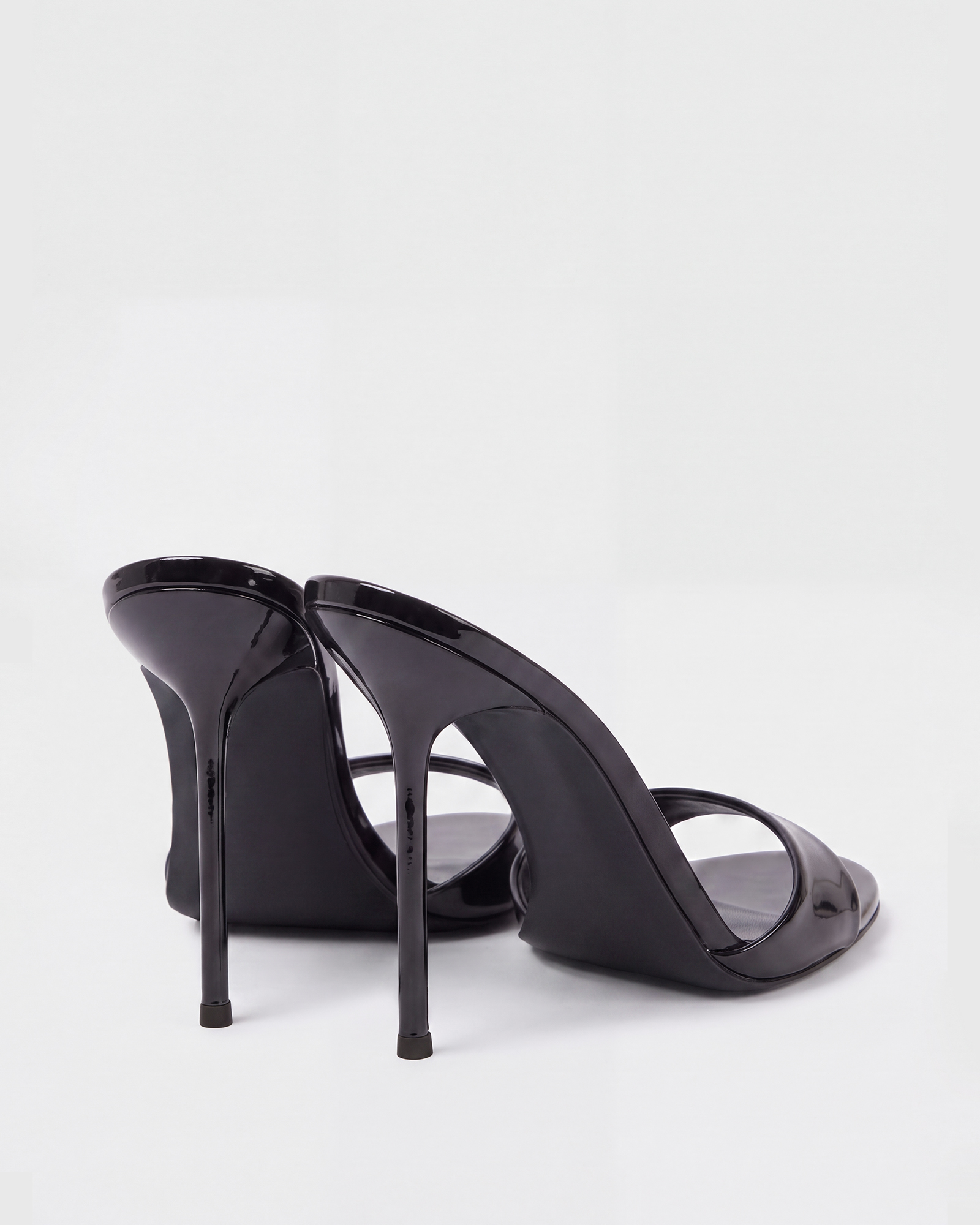 Leslie Patent Leather Mules In Black