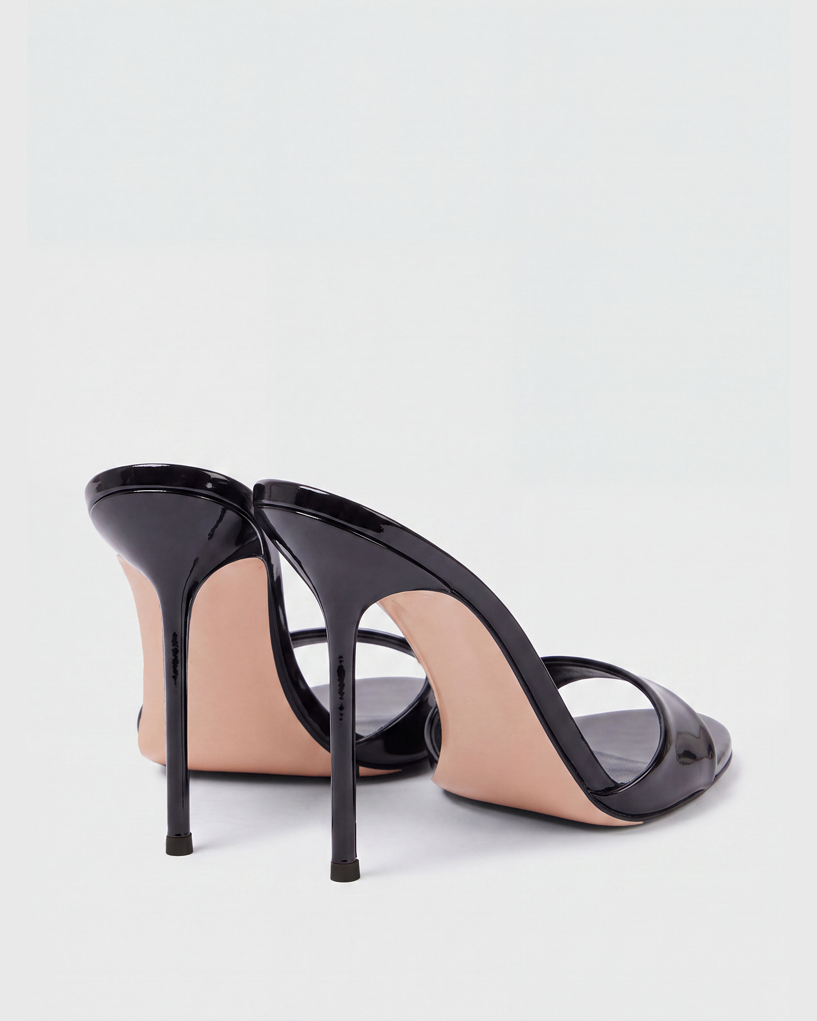 Leslie Patent Leather Mules In Black