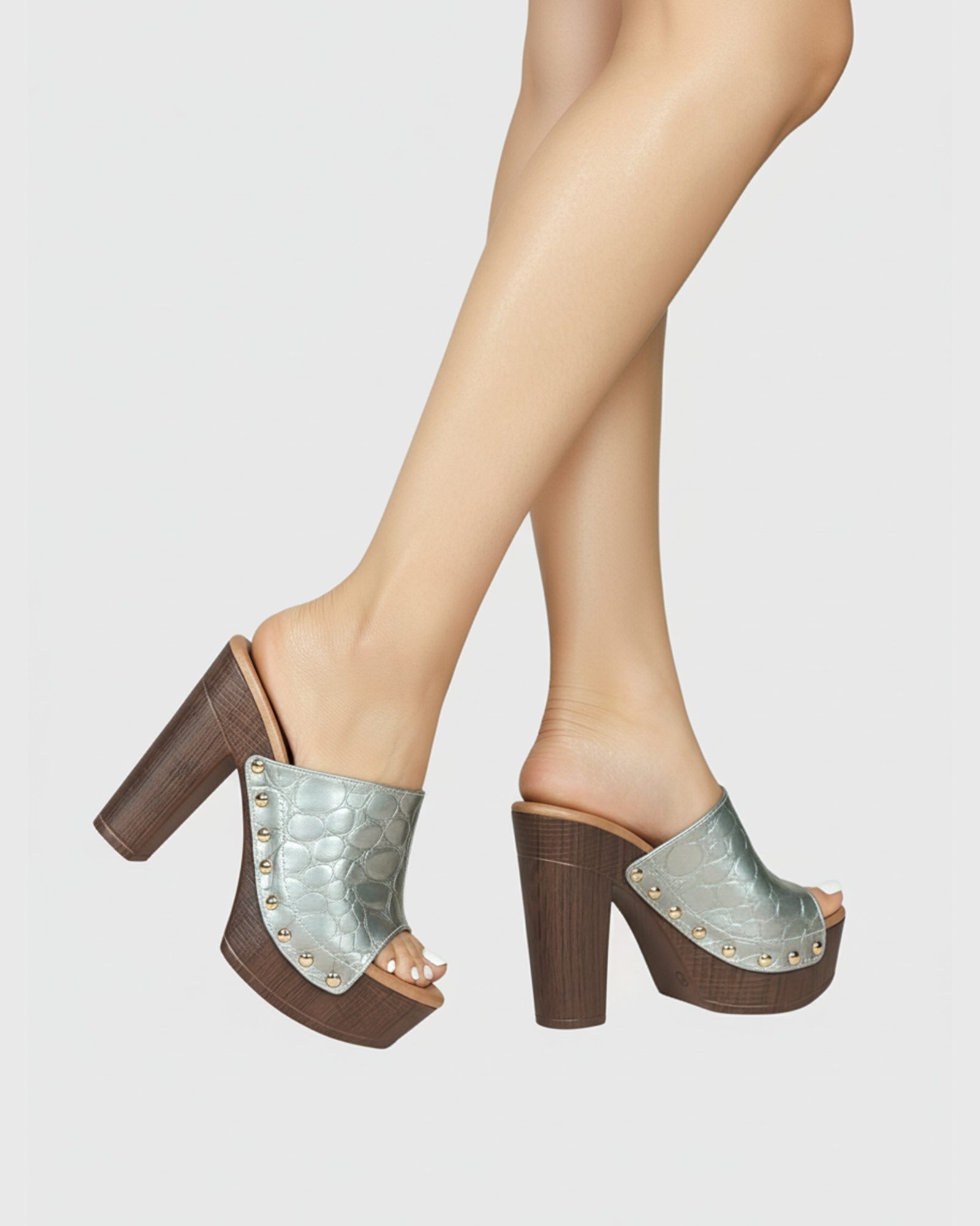 Fiacre Studded Clog Wedge Heels In Silver