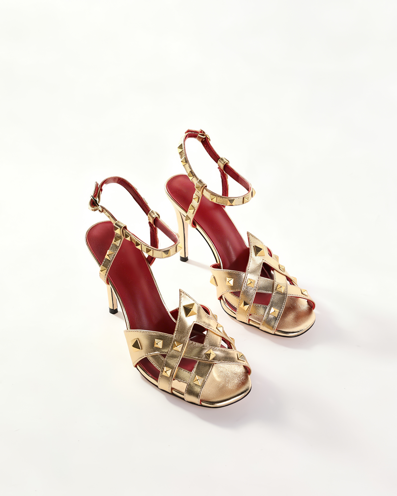 Irune Rivet Cage Sandals In Gold