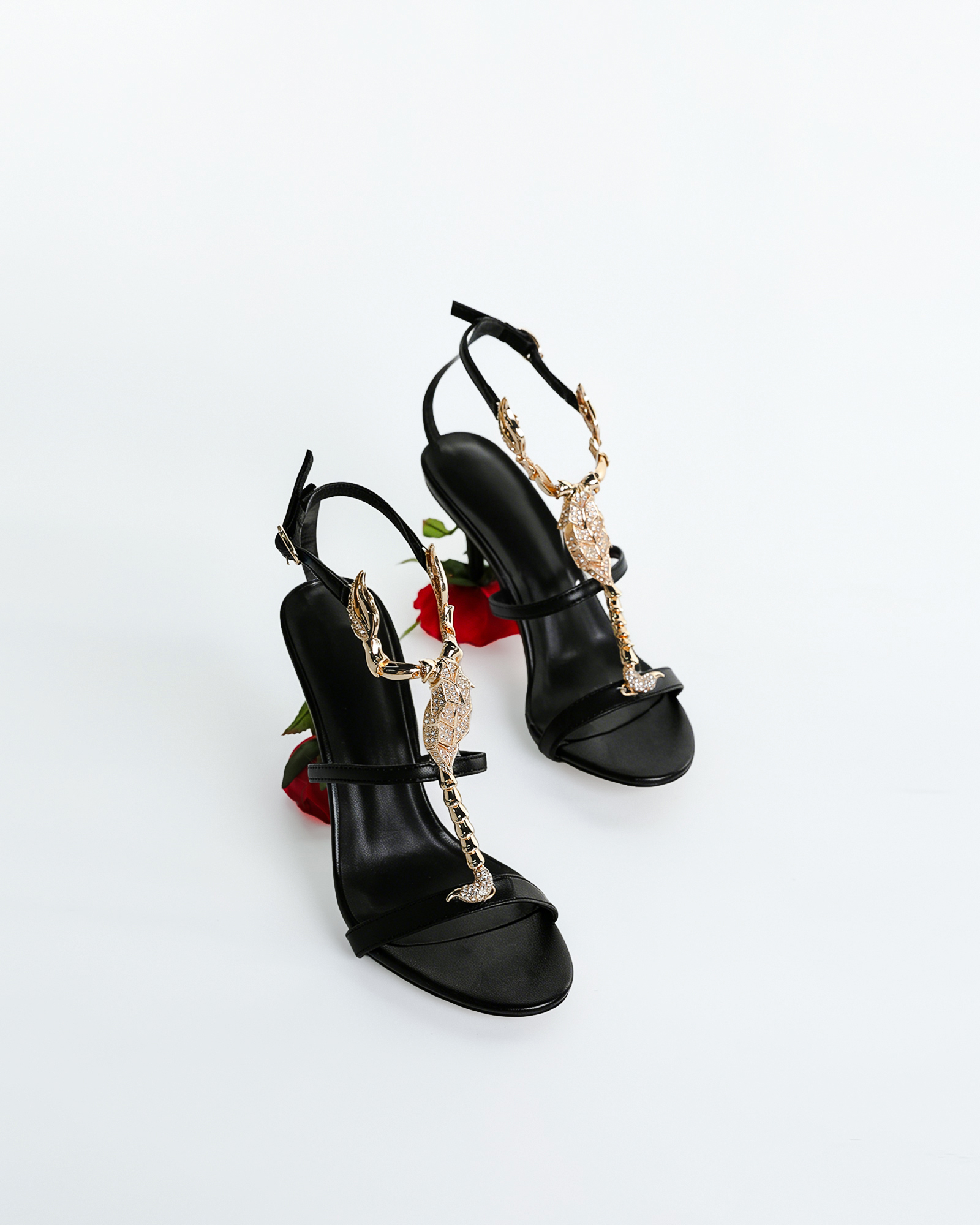 Pia Rhinestone Scorpion Strap Flower Heels In Black