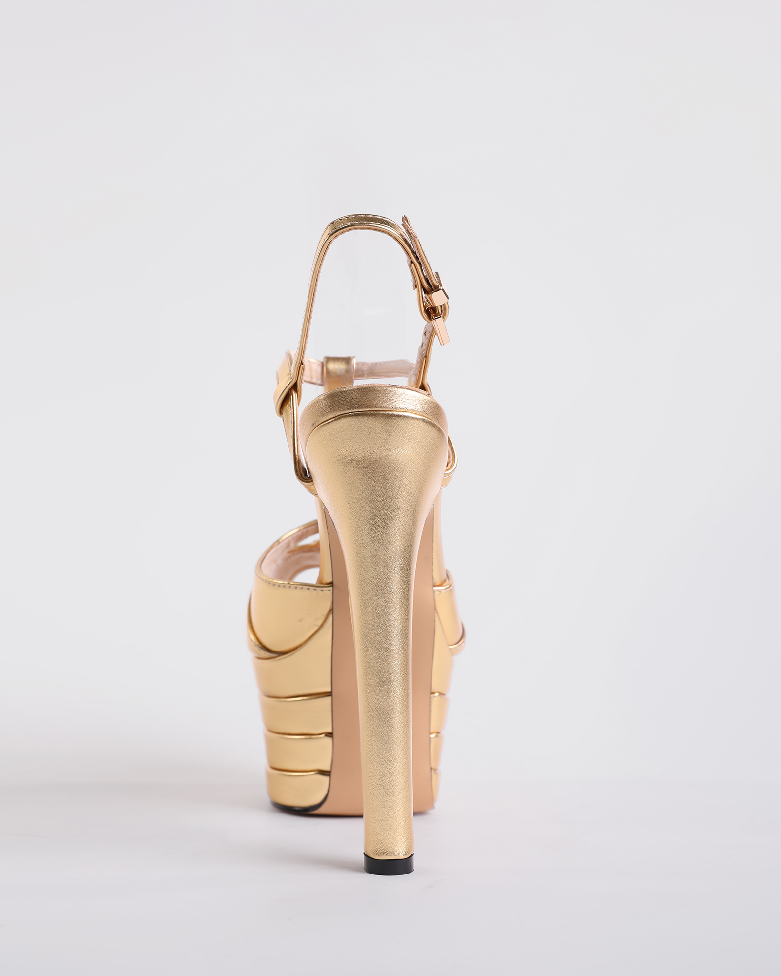 Dionisia Rivet Strap Platform Heels In Gold