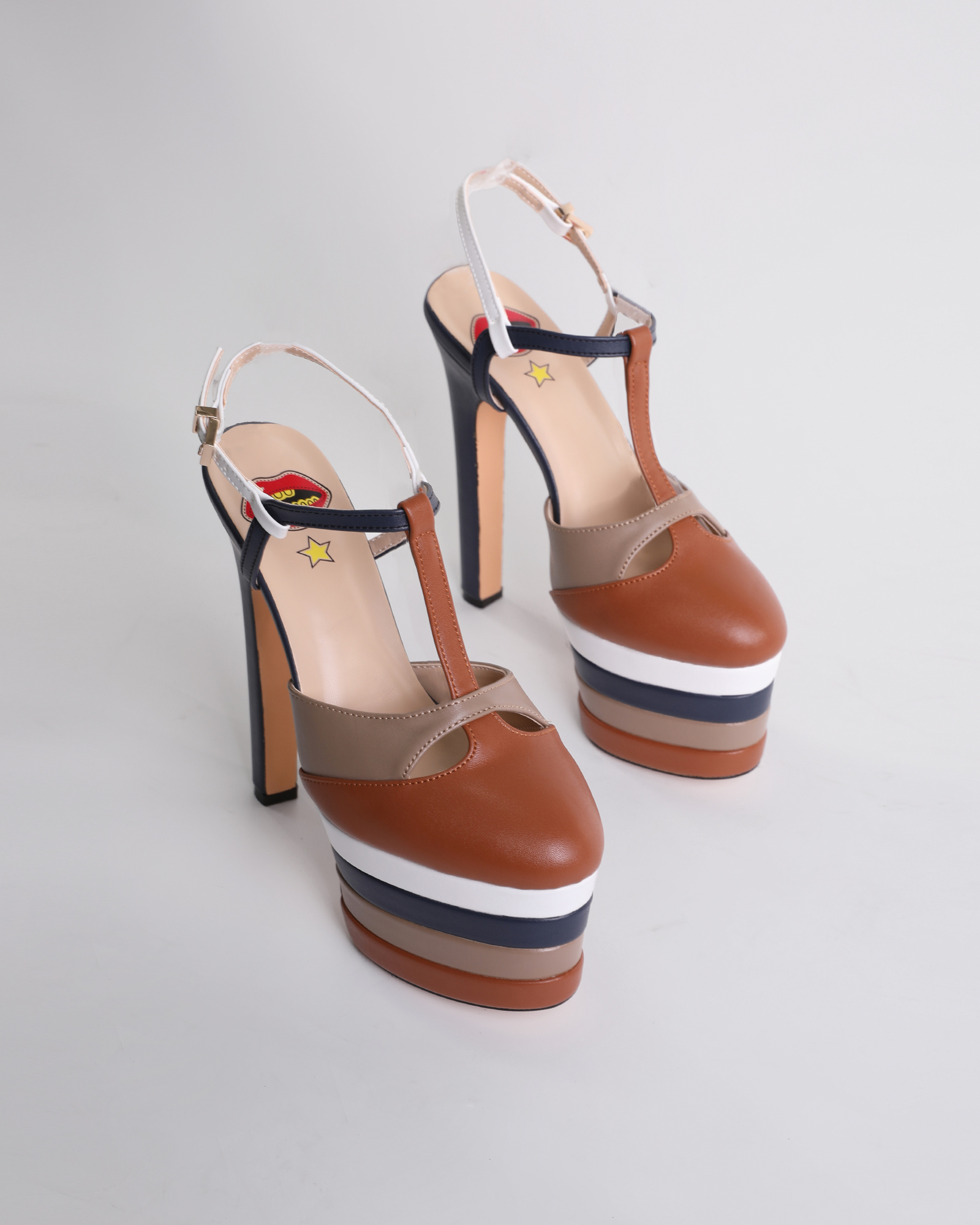 Dionisia Stripe Strap Platform Heels In Brown