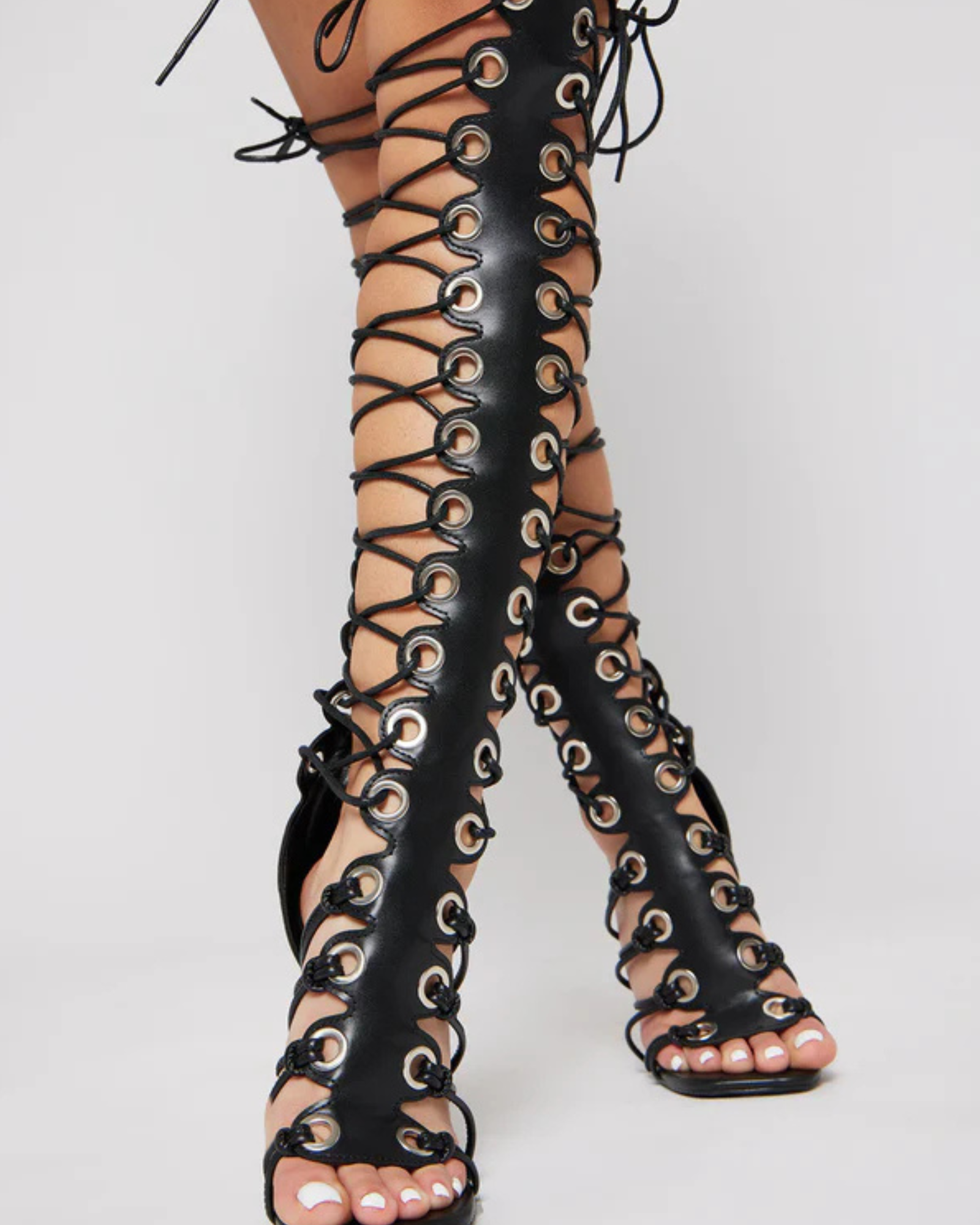 Eddie Eyelet Lace Up Knee High Gladiator Sandals In Black