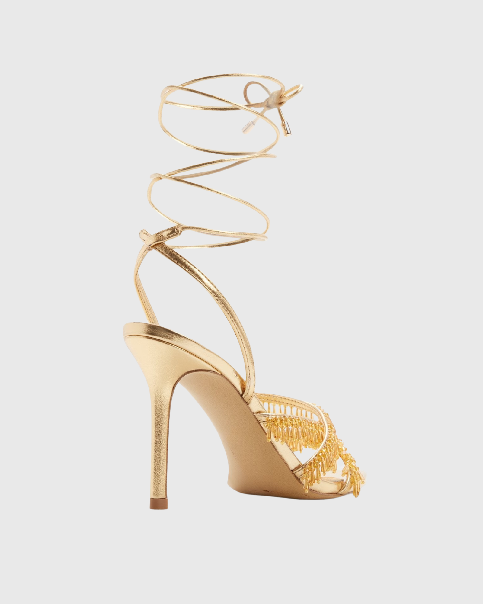 Jorun Fringe Rhinestone Lace Up Sandals In Gold