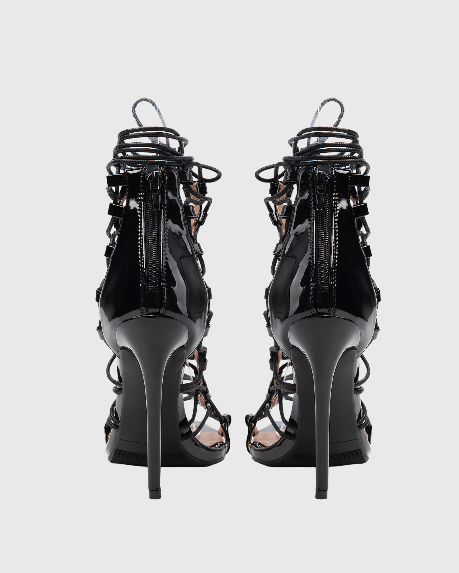 Naja Lace Up Cage High Sandals In Black
