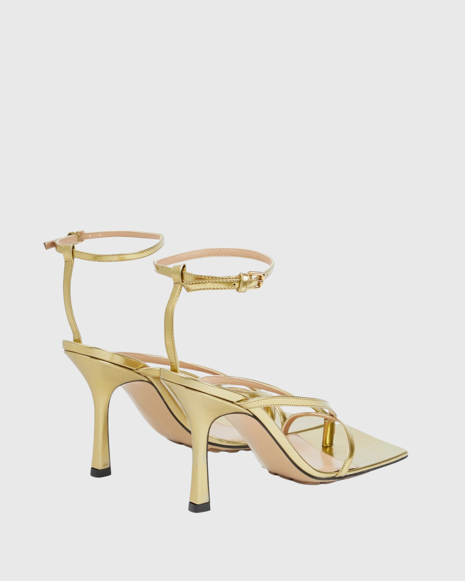Maile Thong Metallic Sandals In Gold