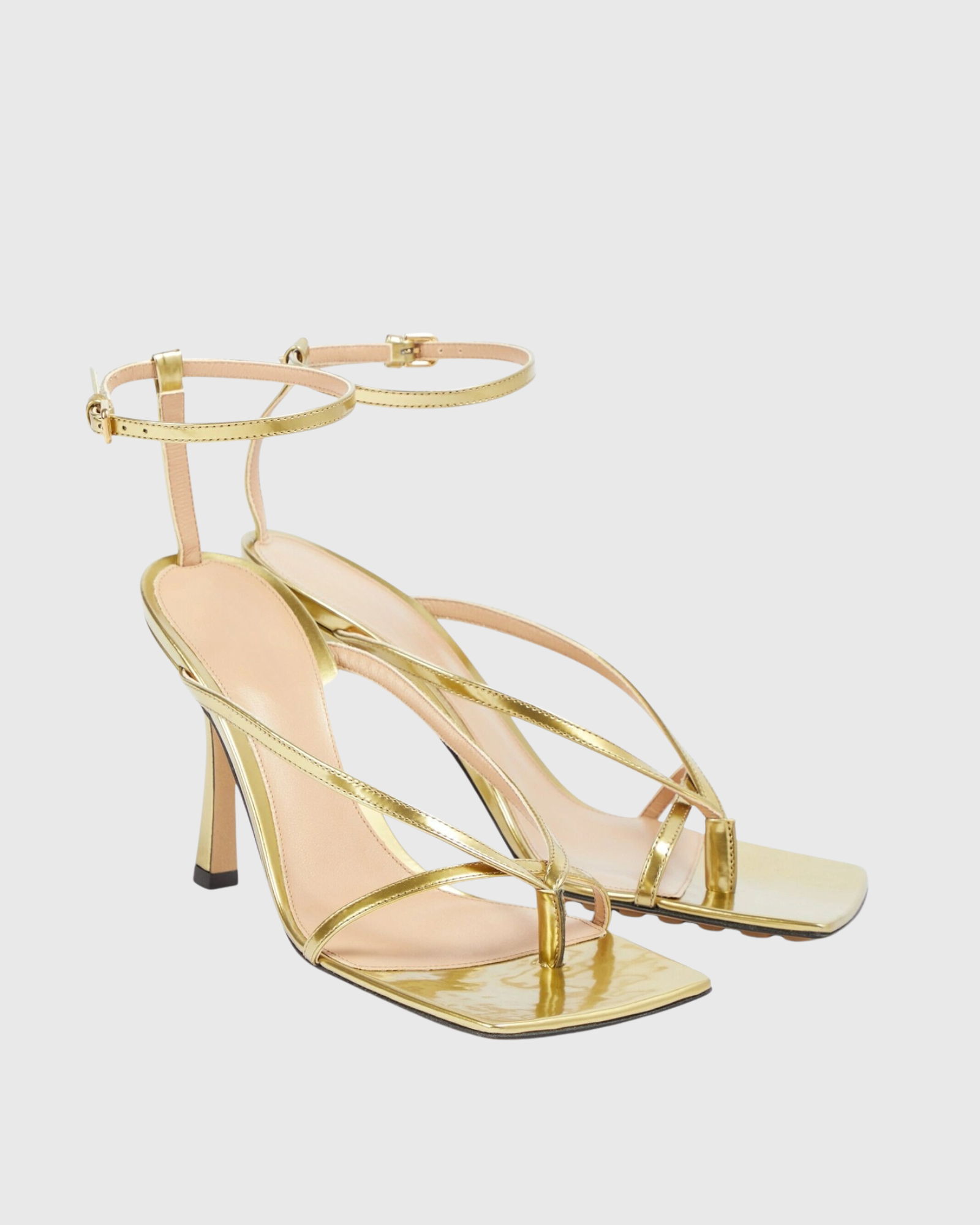Maile Thong Metallic Sandals In Gold