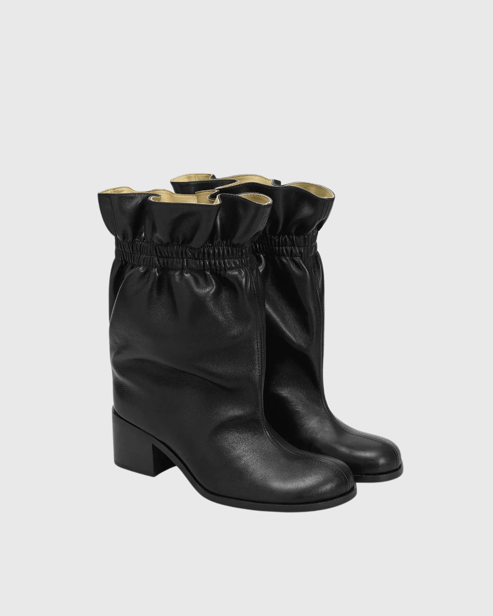 Quasar Ruched Leather Ankle Boots In Black