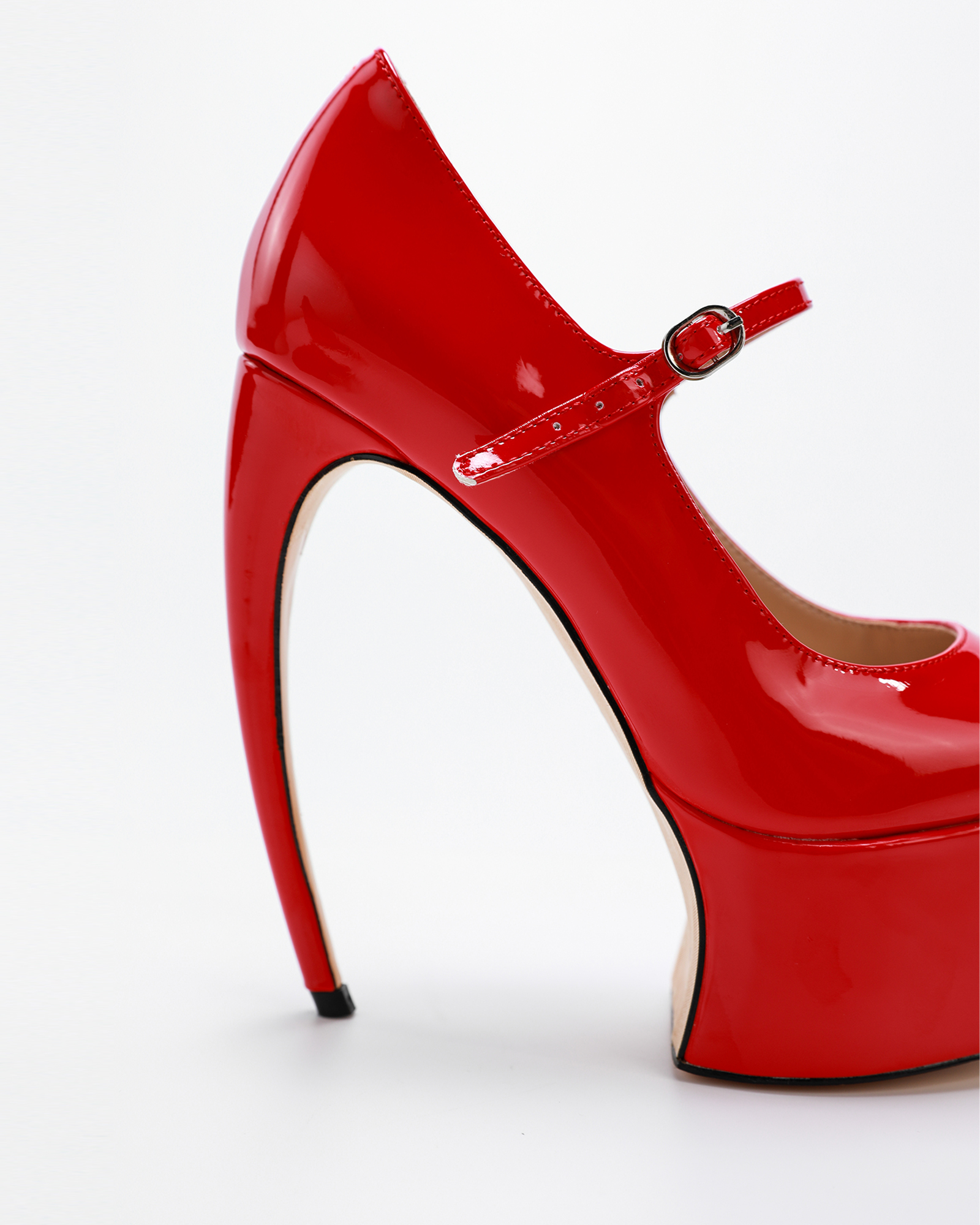 Maha Platform Glossy Pumps In Red