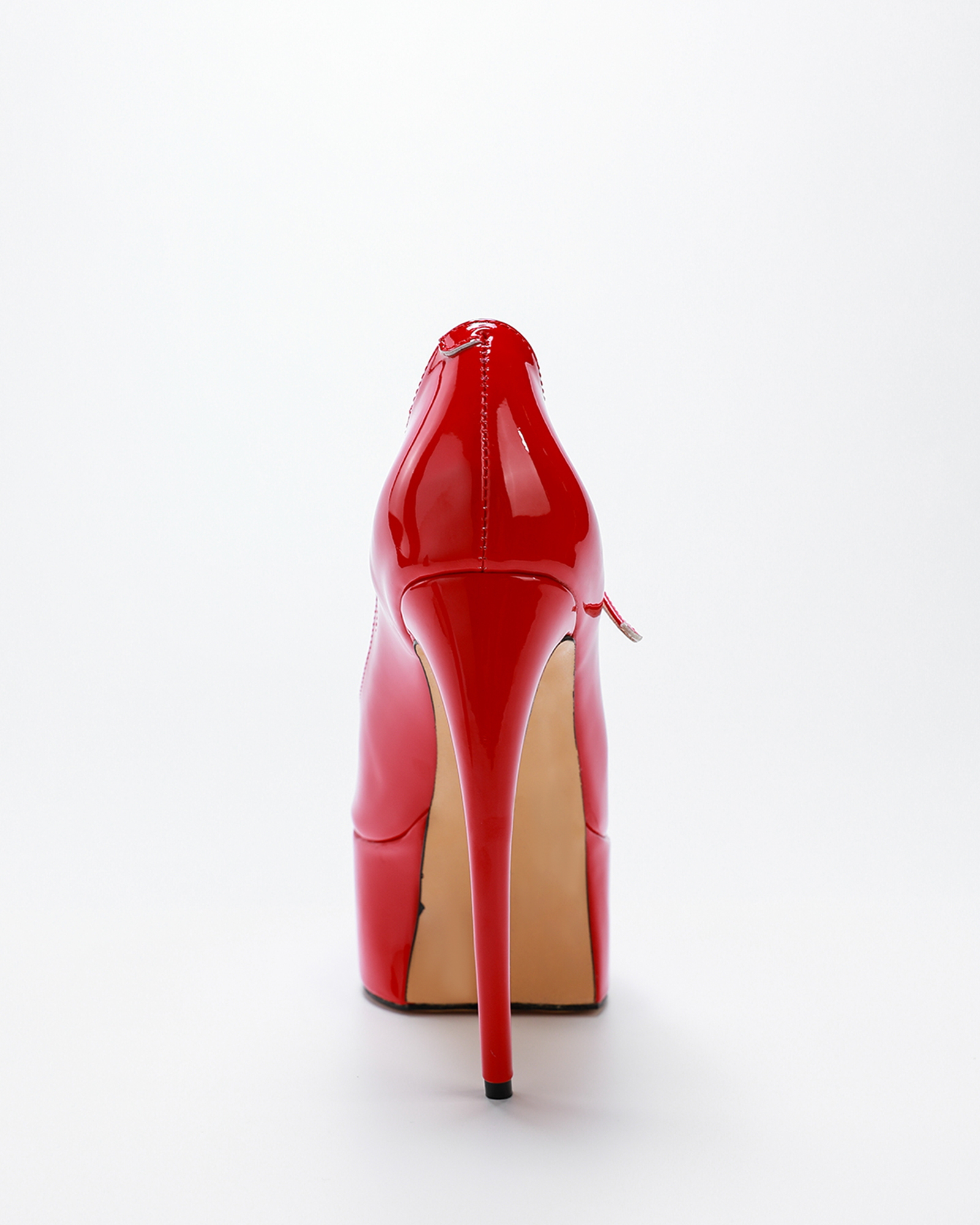 Maha Platform Glossy Pumps In Red