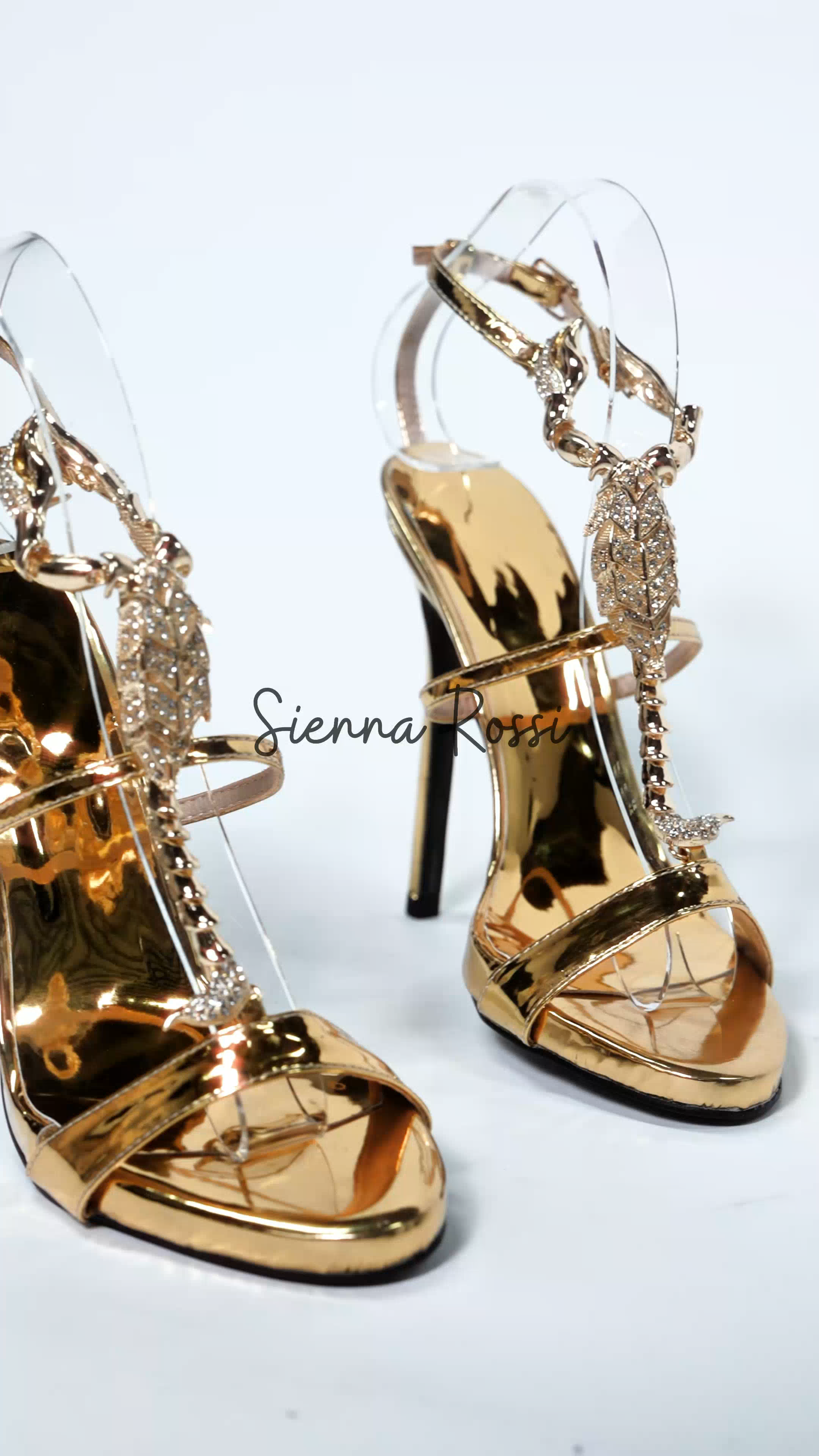 Pia Rhinestone Scorpion Strap Sandals In Gold