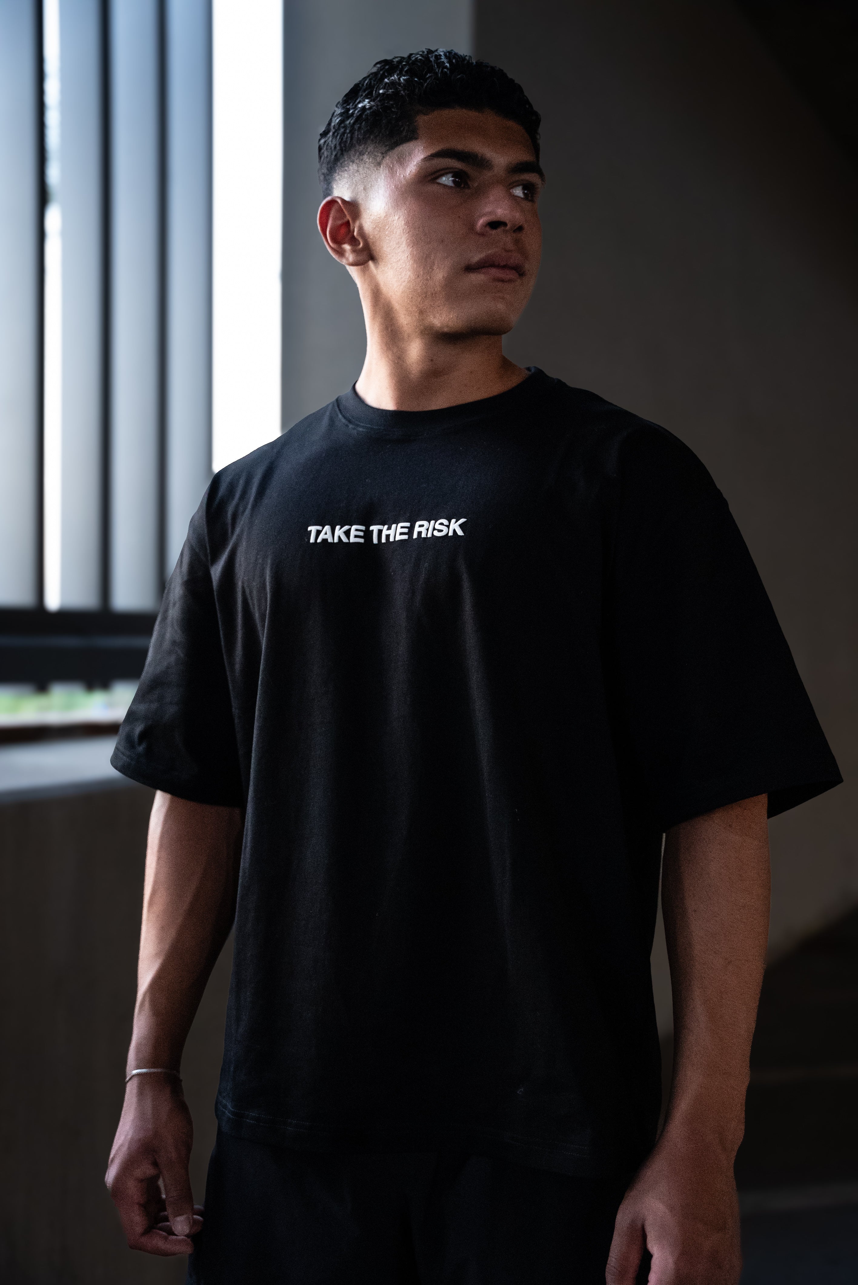 TAKE THE RISK  TEE
