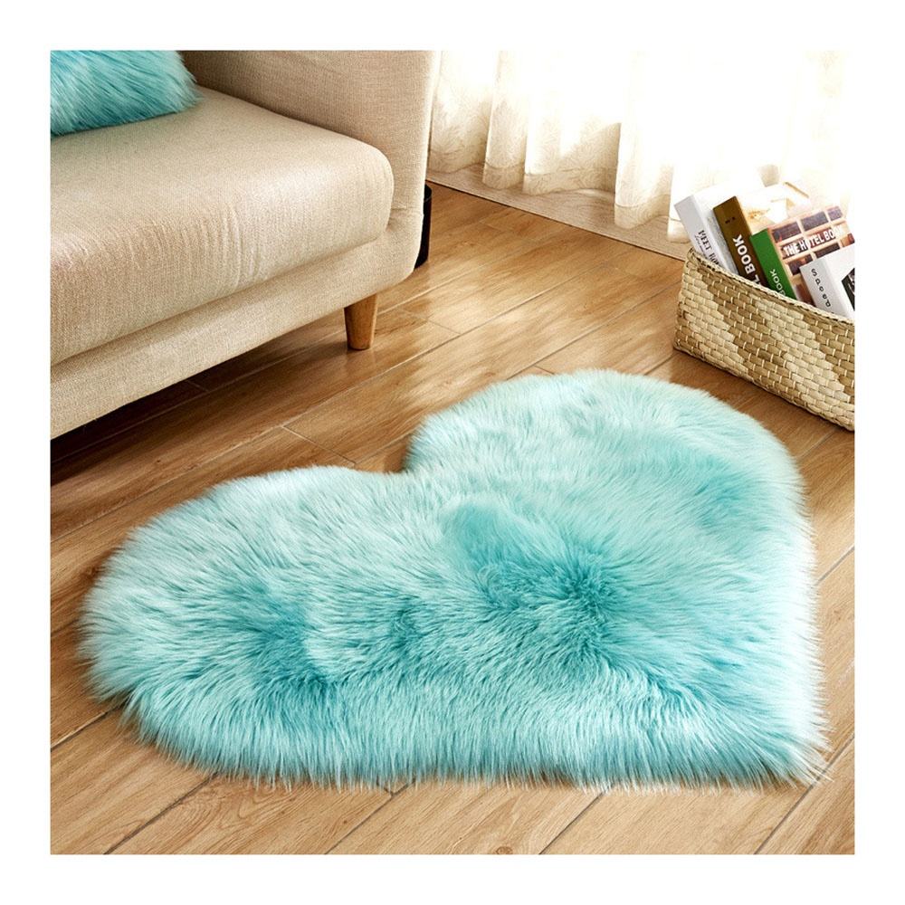 Small pink faux fur rug, washable.