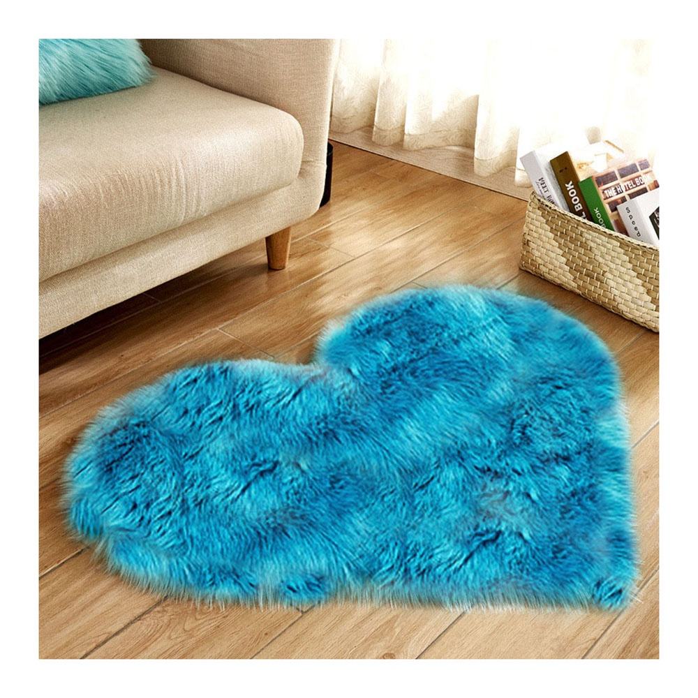 Small pink faux fur rug, washable.