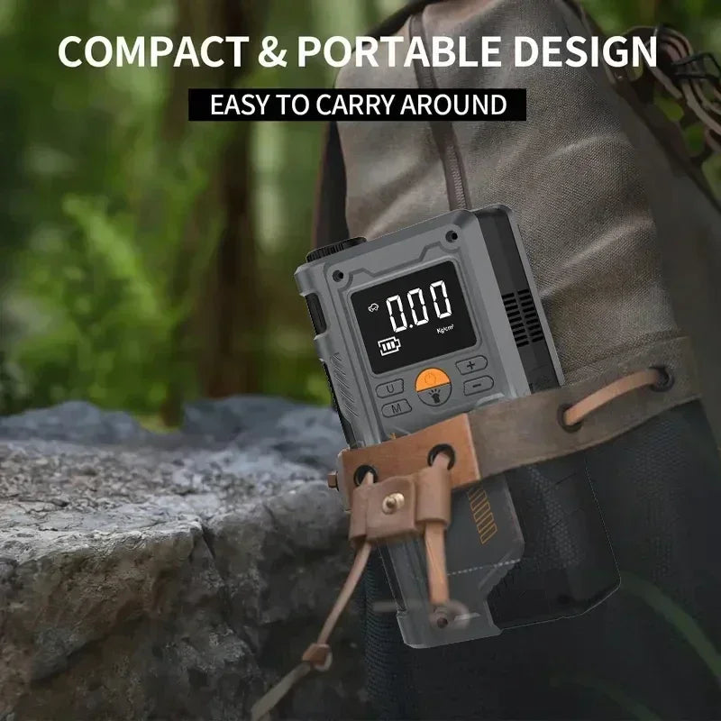 Compact 4 in 1 Jump Starter on a strap with a forest background