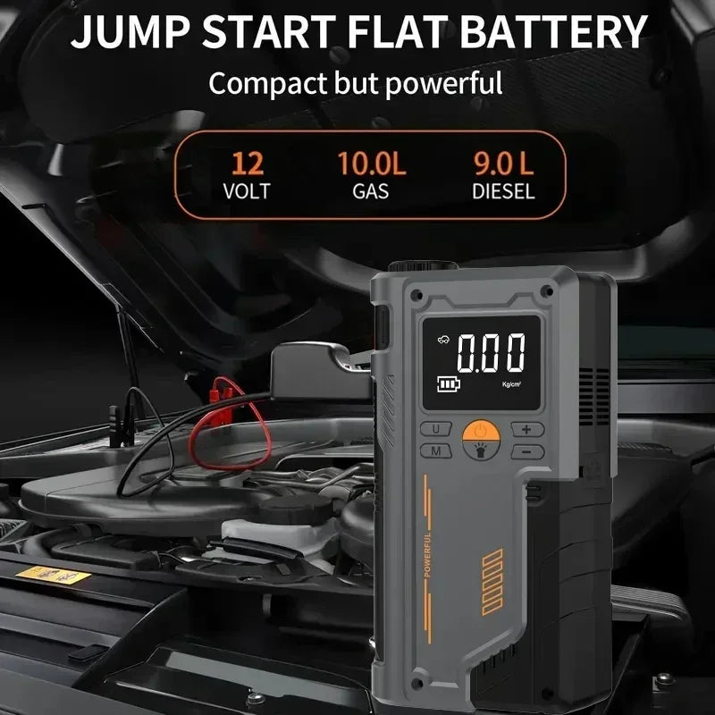 Jump starter device with digital display in a car engine bay, highlighting specifications.