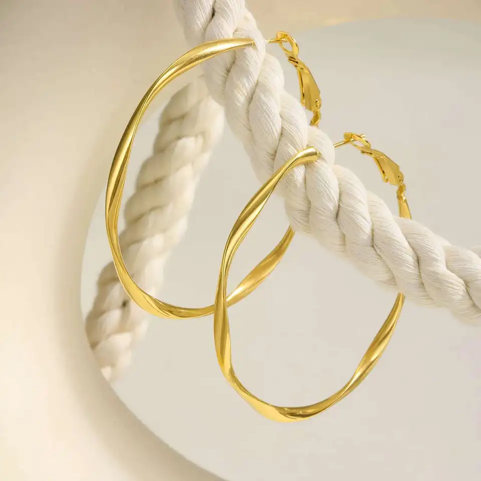 Prjewel Stainless Steel Twist Circle Women Earrings Click-Top Mobius Hoop Hies Earring Tarnish And Nickel Free Mother's Day Gift