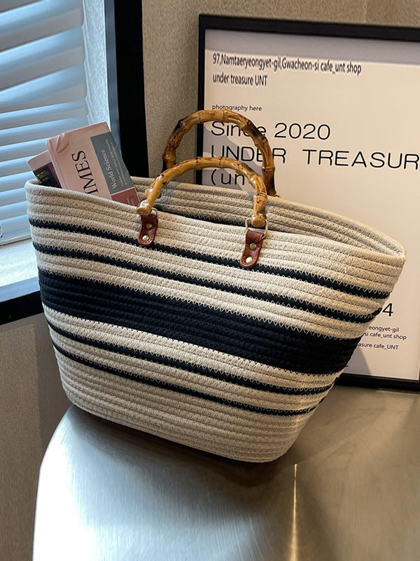 Striped handbags with a contrasting split-joint detail