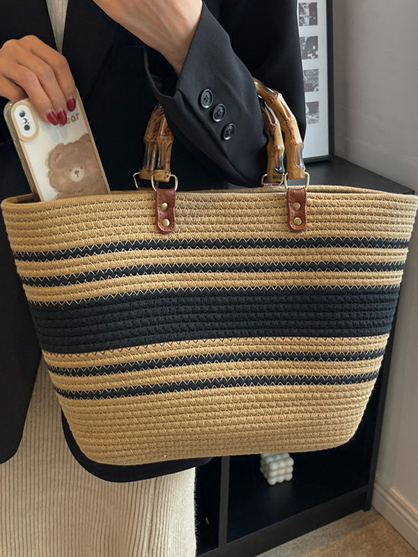 Striped handbags with a contrasting split-joint detail