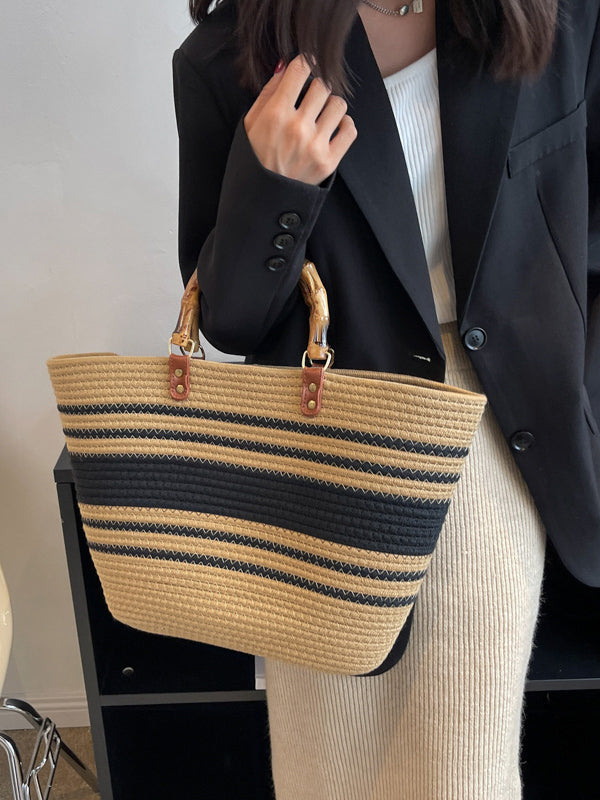 Striped handbags with a contrasting split-joint detail
