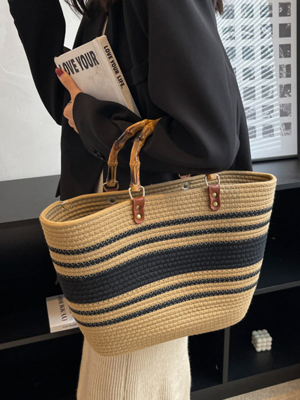 Striped handbags with a contrasting split-joint detail