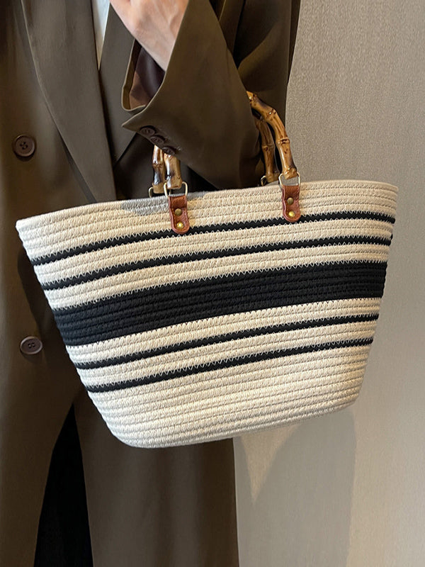 Striped handbags with a contrasting split-joint detail