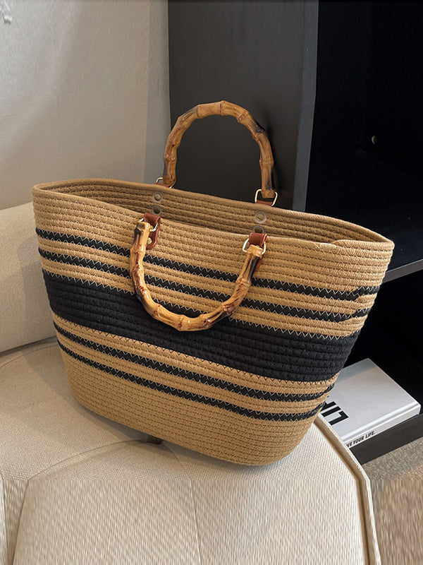 Striped handbags with a contrasting split-joint detail