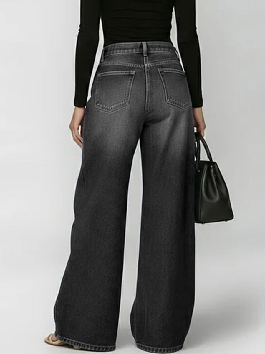 High-waisted, unbuttoned, geometric hollow-pocket jeans with split-seam detailing.