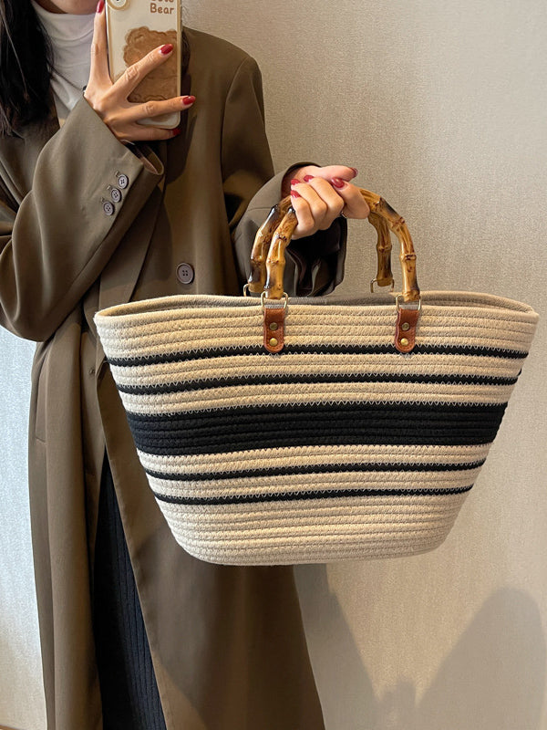 Striped handbags with a contrasting split-joint detail