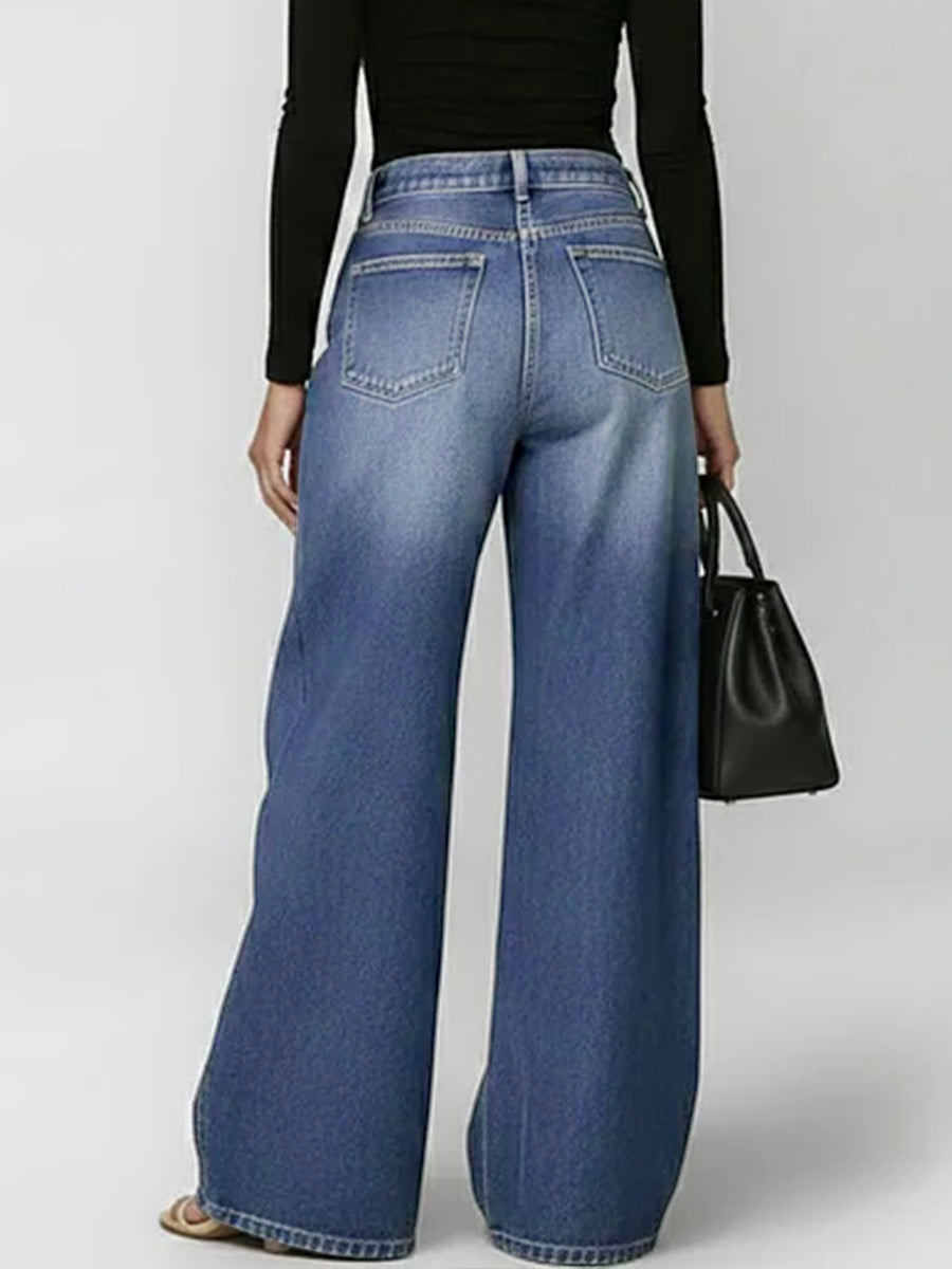 High-waisted, unbuttoned, geometric hollow-pocket jeans with split-seam detailing.