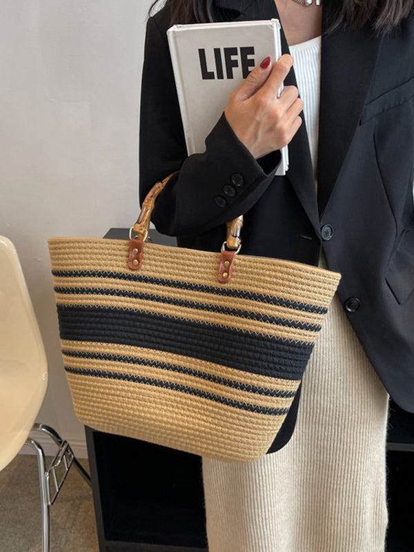 Striped handbags with a contrasting split-joint detail