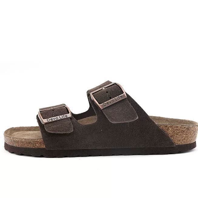 Women's sandals featuring a contoured cork sole that molds to the foot, with an adjustable double-buckle design.