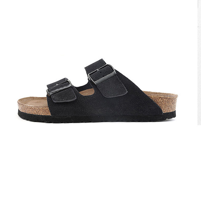 Women's sandals featuring a contoured cork sole that molds to the foot, with an adjustable double-buckle design.